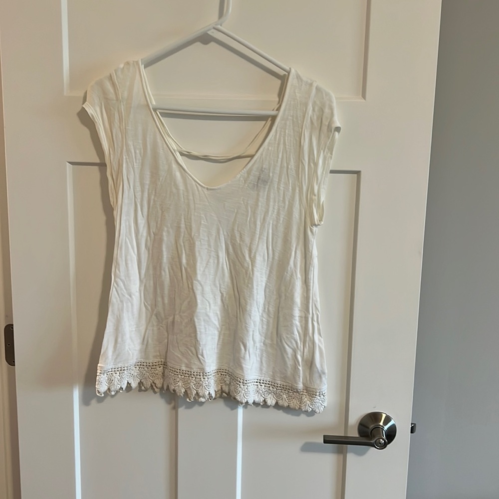 S white American Eagle shirt with open back